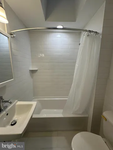 a bathroom with a sink and a tub
