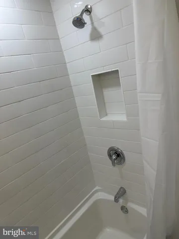 a bathroom with a bathtub