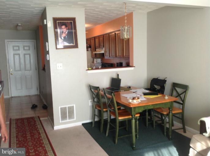 2917 Hickory Leaf Way Silver Spring, MD 20904 - Photo 6 of 8 a dining room with furniture and wooden floor