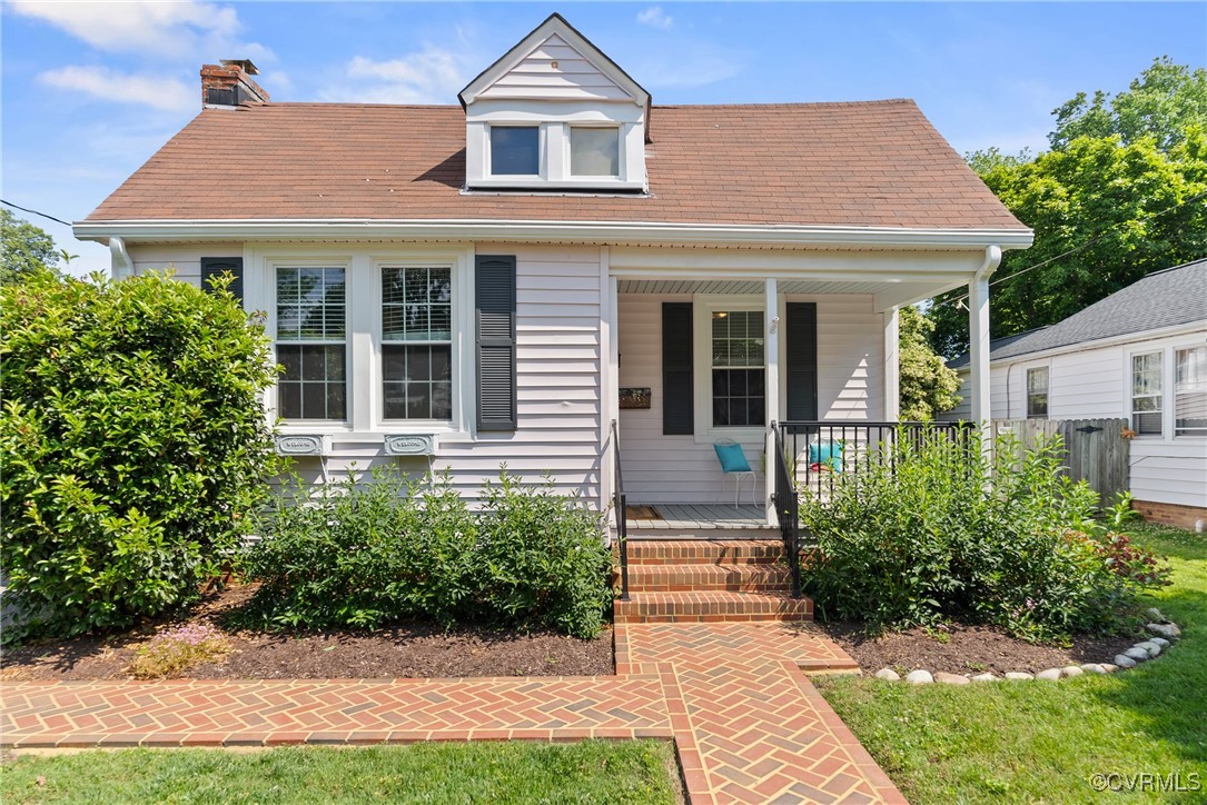 1712 Seddon Road Richmond, VA 23227 - Photo 1 of 29 View of front of house with a porch and a chimney