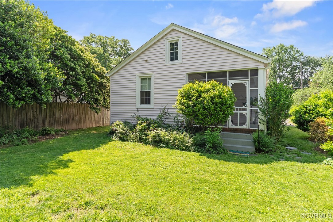 1712 Seddon Road Richmond, VA 23227 - Photo 23 of 29 Back of property featuring a sunroom