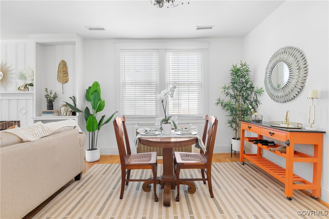 1712 Seddon Road Richmond, VA 23227 - Photo 3 of 29 Dining area featuring wood finished floors and bas