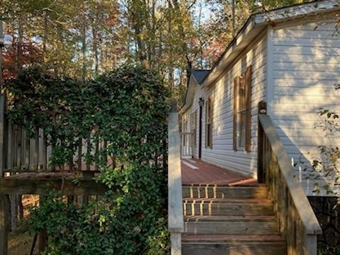 611 Hank Fry Road Clarkesville, GA 30523 - Photo 1 of 1 a backyard of a house with lots of green space