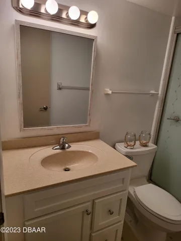a bathroom with a sink and a toilet