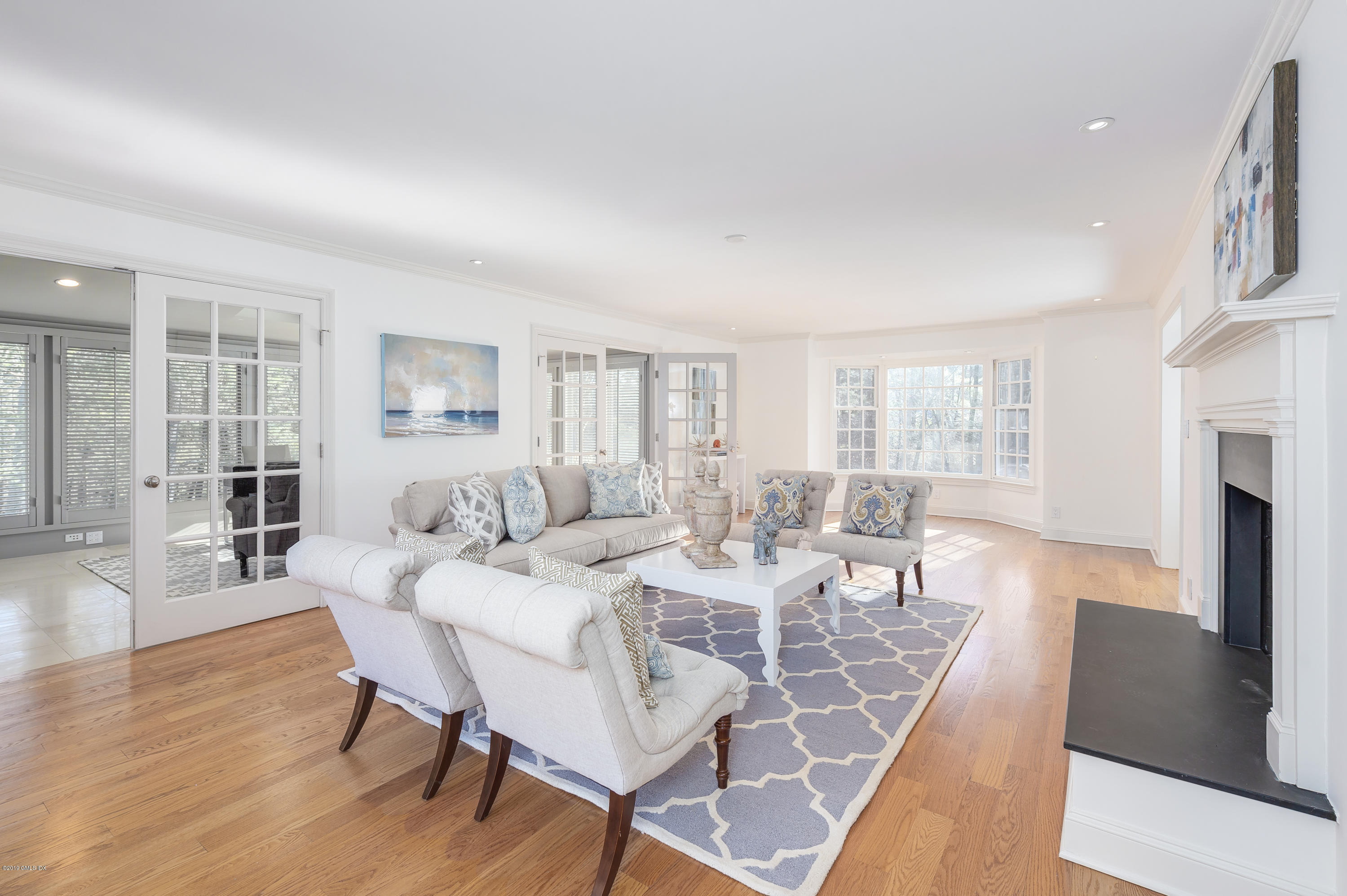 111 Dingletown Road Greenwich, CT 06830 - Photo 12 of 44 a view of a dining room with furniture and wooden floor