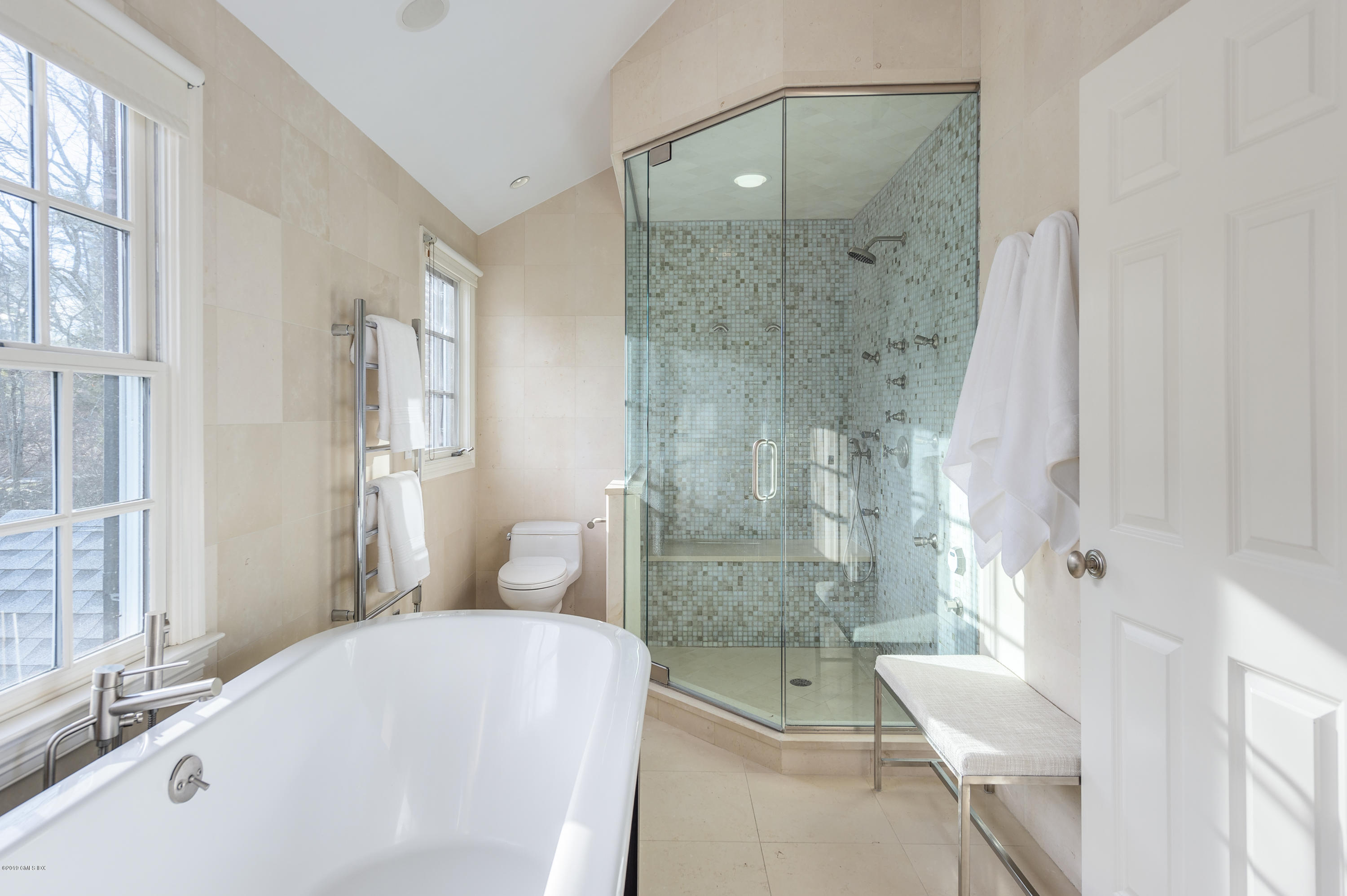 111 Dingletown Road Greenwich, CT 06830 - Photo 22 of 44 a bath room with a bath tub and shower