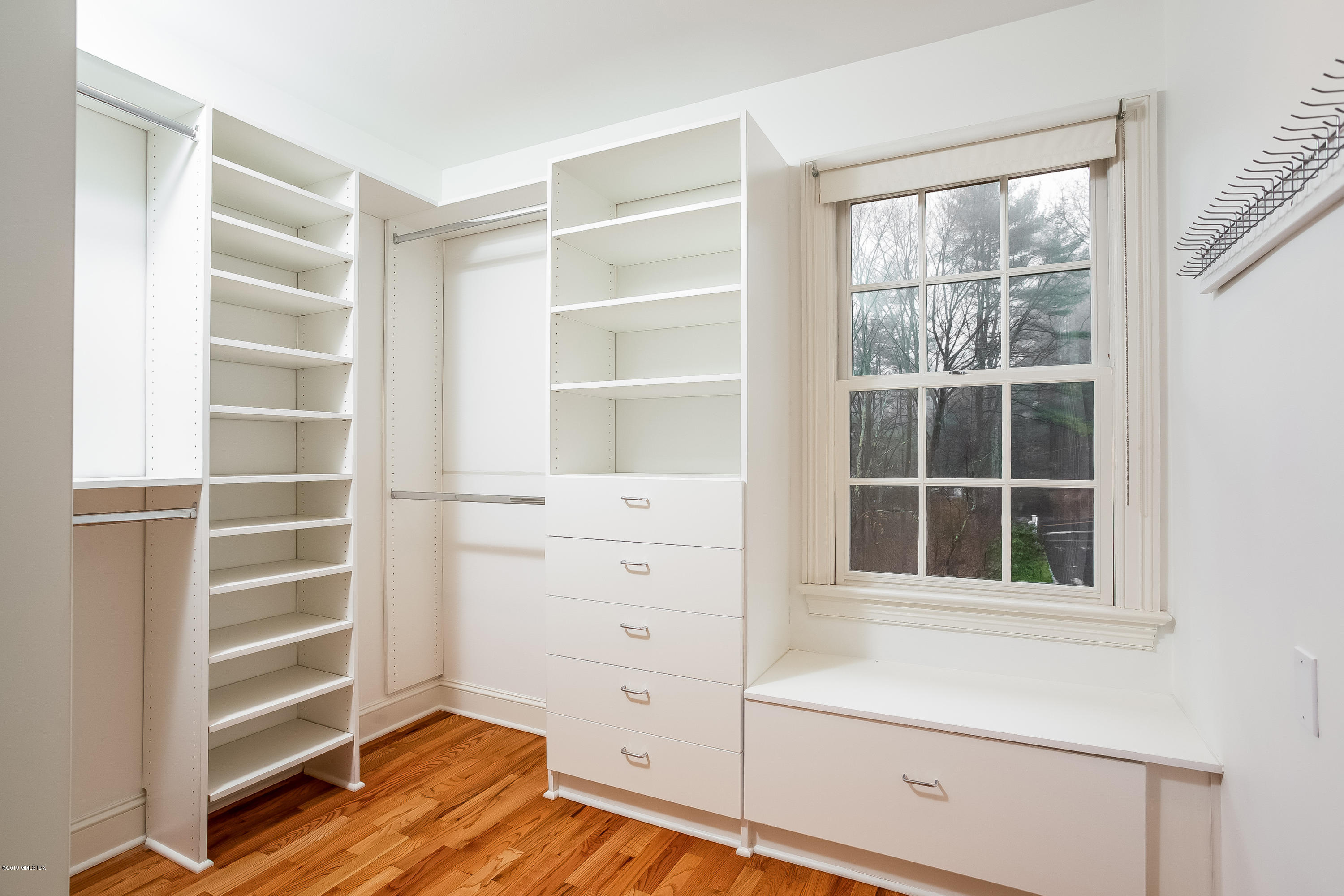 111 Dingletown Road Greenwich, CT 06830 - Photo 24 of 44 a view of an empty room with a window