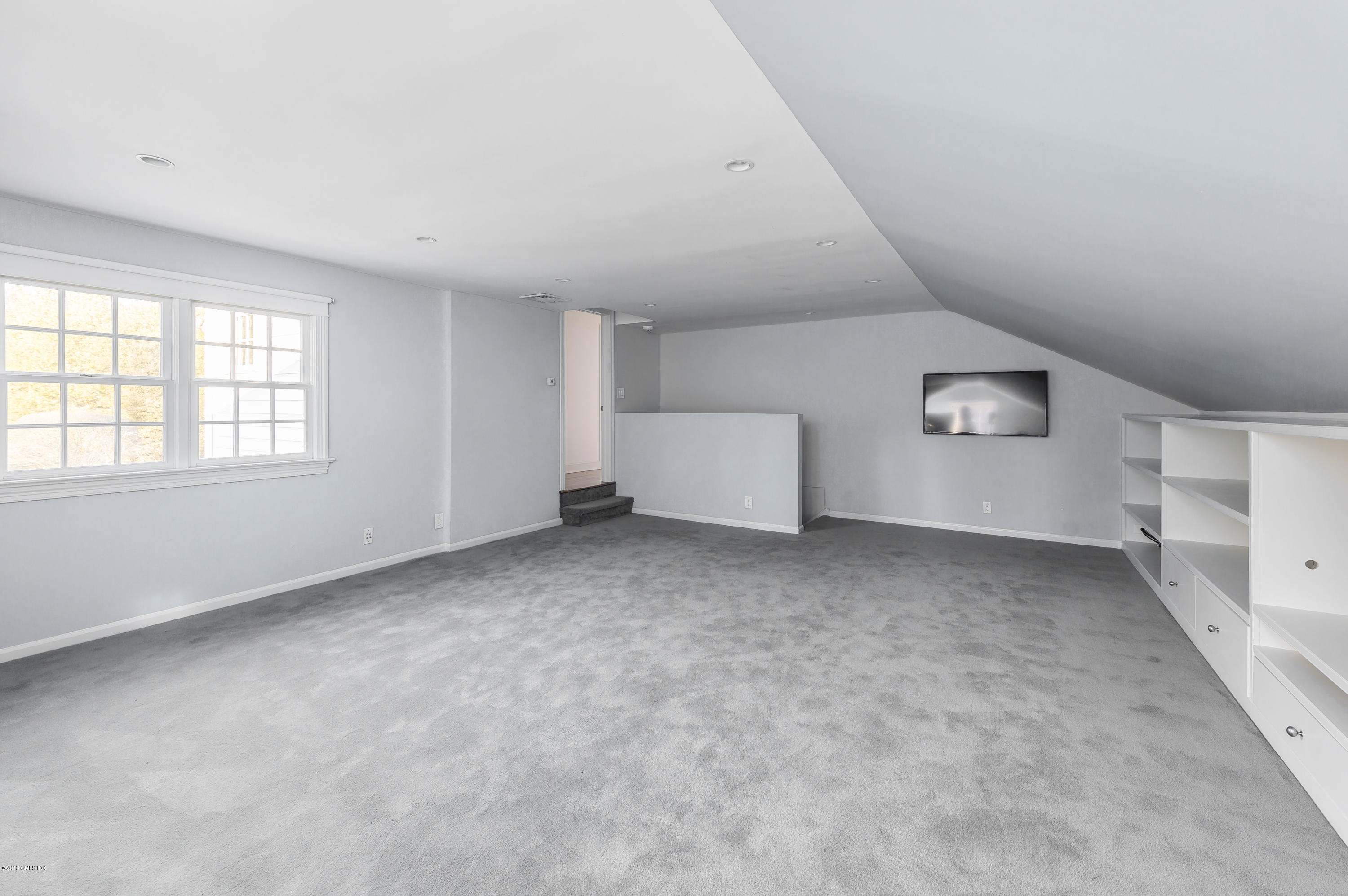 111 Dingletown Road Greenwich, CT 06830 - Photo 31 of 44 an empty room with windows