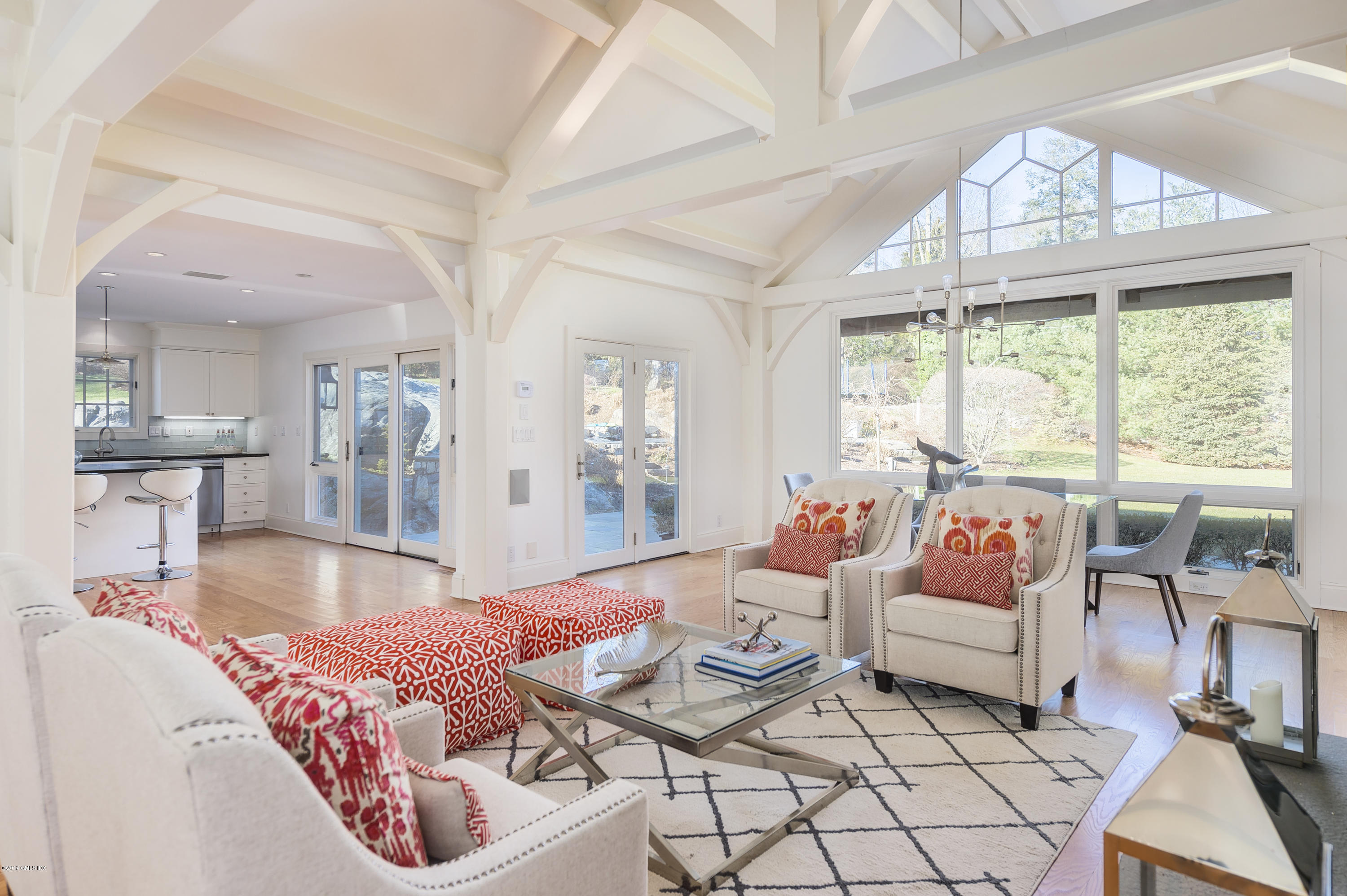 111 Dingletown Road Greenwich, CT 06830 - Photo 5 of 44 a living room with furniture and a large window