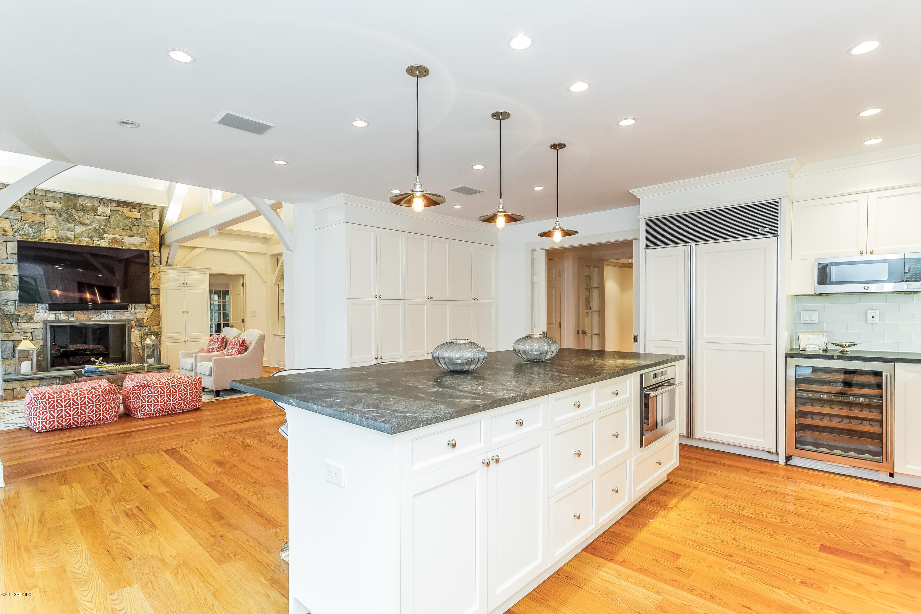 111 Dingletown Road Greenwich, CT 06830 - Photo 10 of 44 a large kitchen with kitchen island a large counter top stainless steel appliances and cabinets