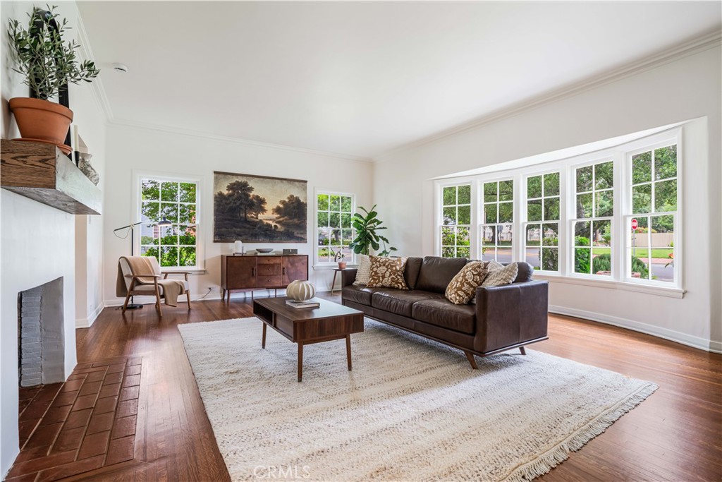 3500 Grayburn Road Pasadena, CA 91107 - Photo 1 of 60 a living room with furniture and a fireplace