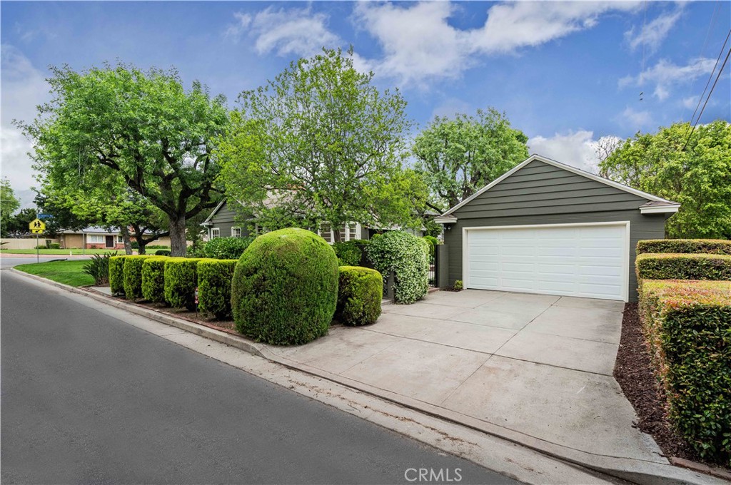 3500 Grayburn Road Pasadena, CA 91107 - Photo 50 of 60 a front view of a house with a garden and plants