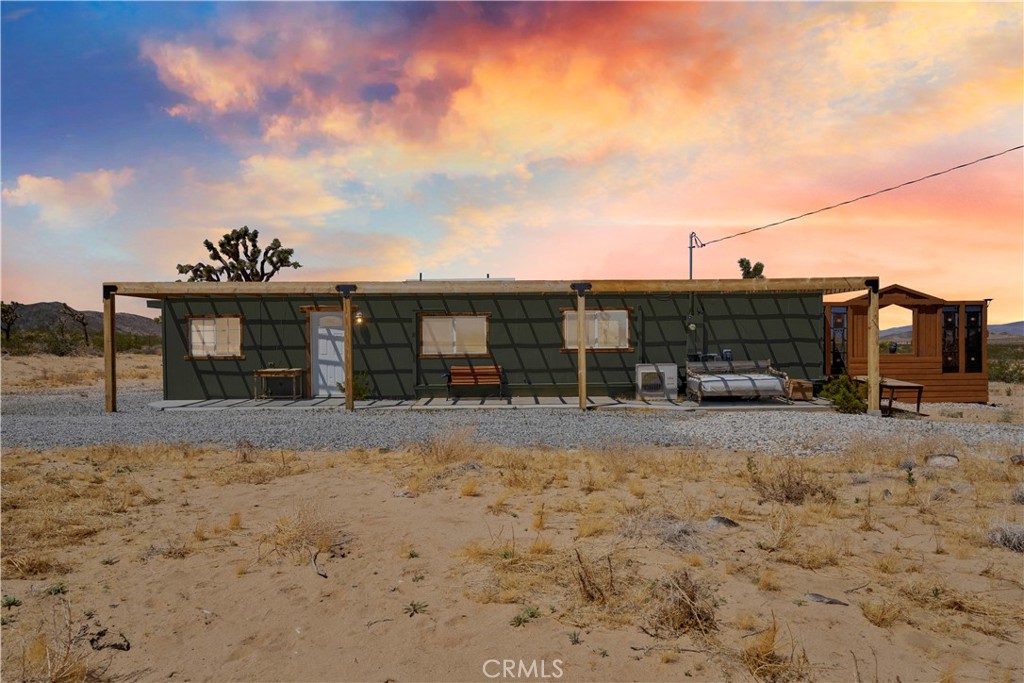 2750 Gibralter Road Landers, CA 92285 - Photo 2 of 56 a view of a house with a yard