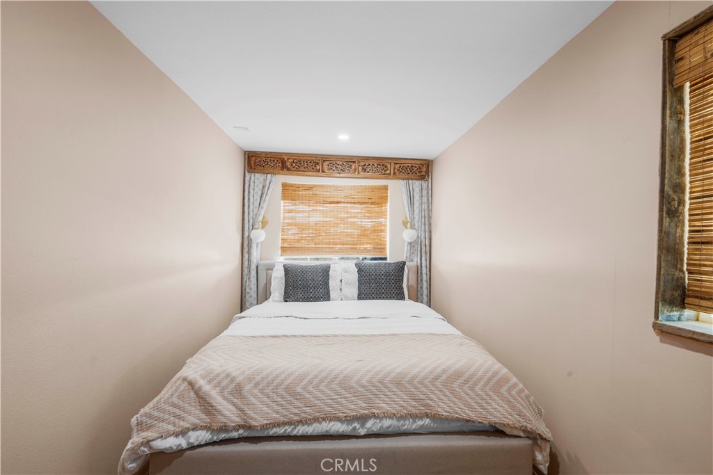 2750 Gibralter Road Landers, CA 92285 - Photo 35 of 56 a bedroom with a bed and a window