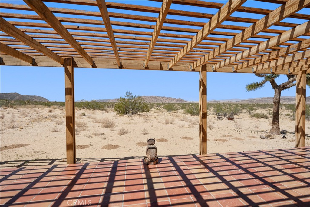 2750 Gibralter Road Landers, CA 92285 - Photo 41 of 56 a view of a balcony with a yard
