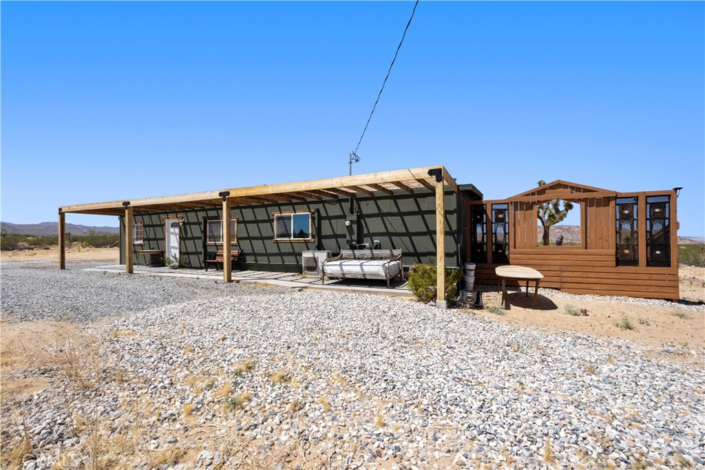 2750 Gibralter Road Landers, CA 92285 - Photo 42 of 56 a view of a house with a outdoor space