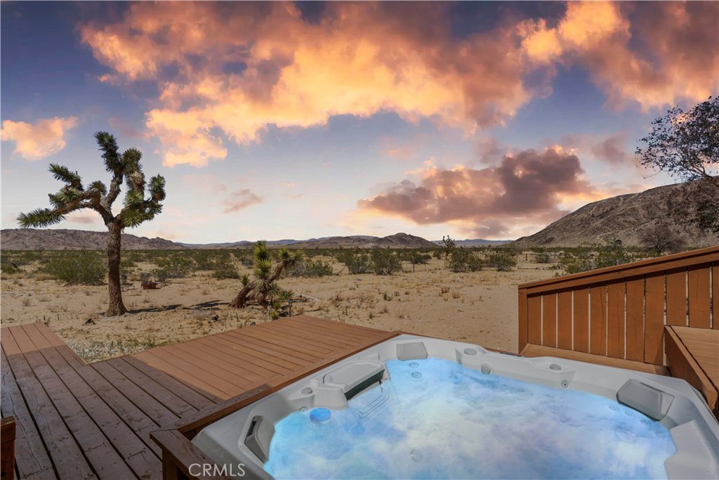 2750 Gibralter Road Landers, CA 92285 - Photo 5 of 56 a view of a terrace with a lake