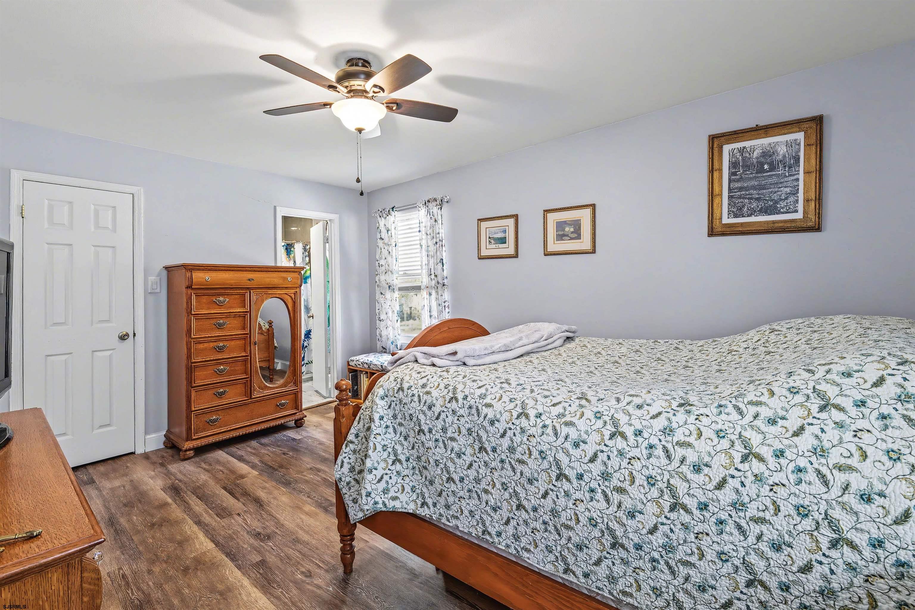 655 Weilers Lane Absecon, NJ 08201 - Photo 12 of 31 a bedroom with a bed and a dresser