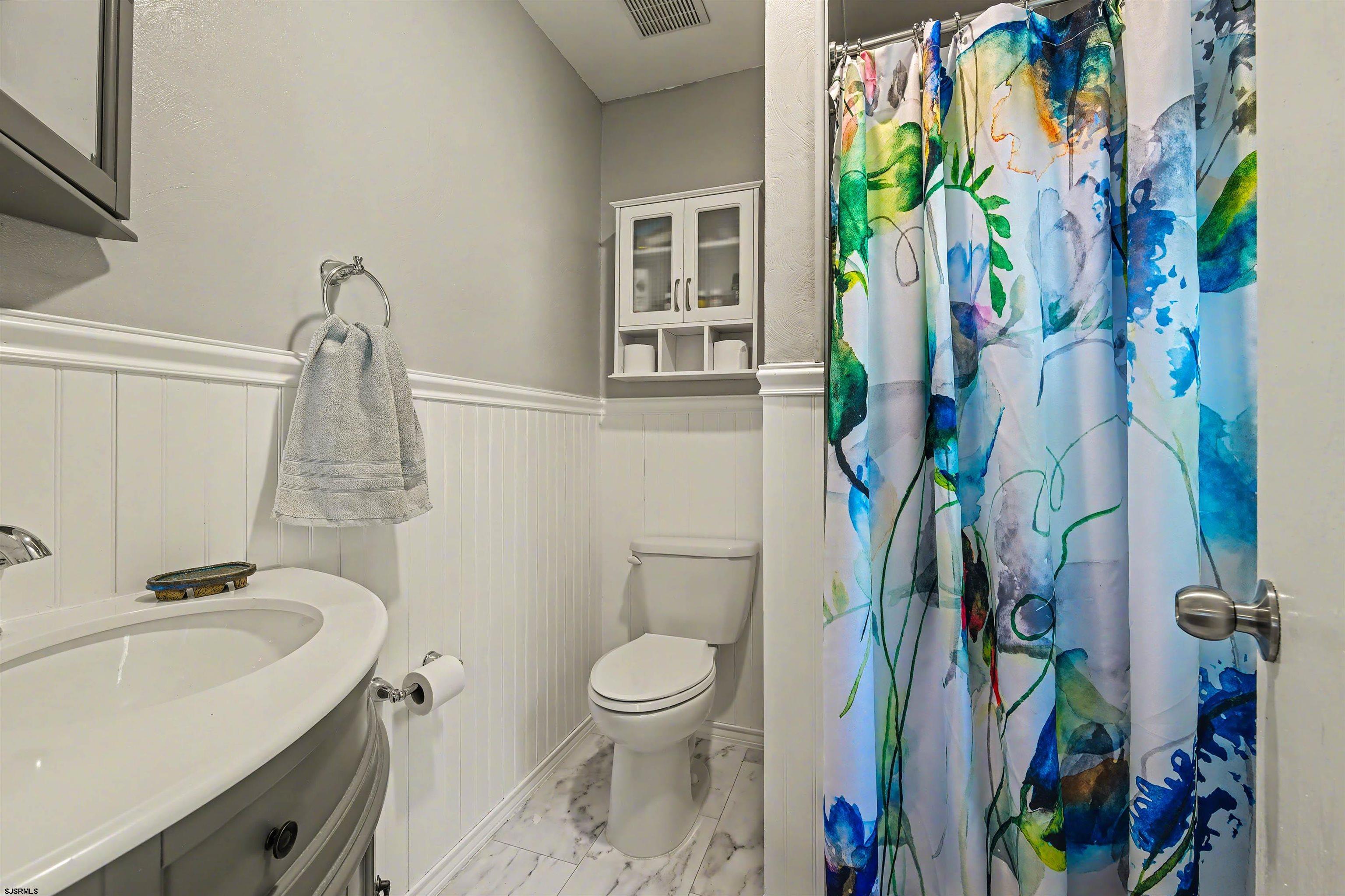 655 Weilers Lane Absecon, NJ 08201 - Photo 13 of 31 a bathroom with a sink toilet and shower