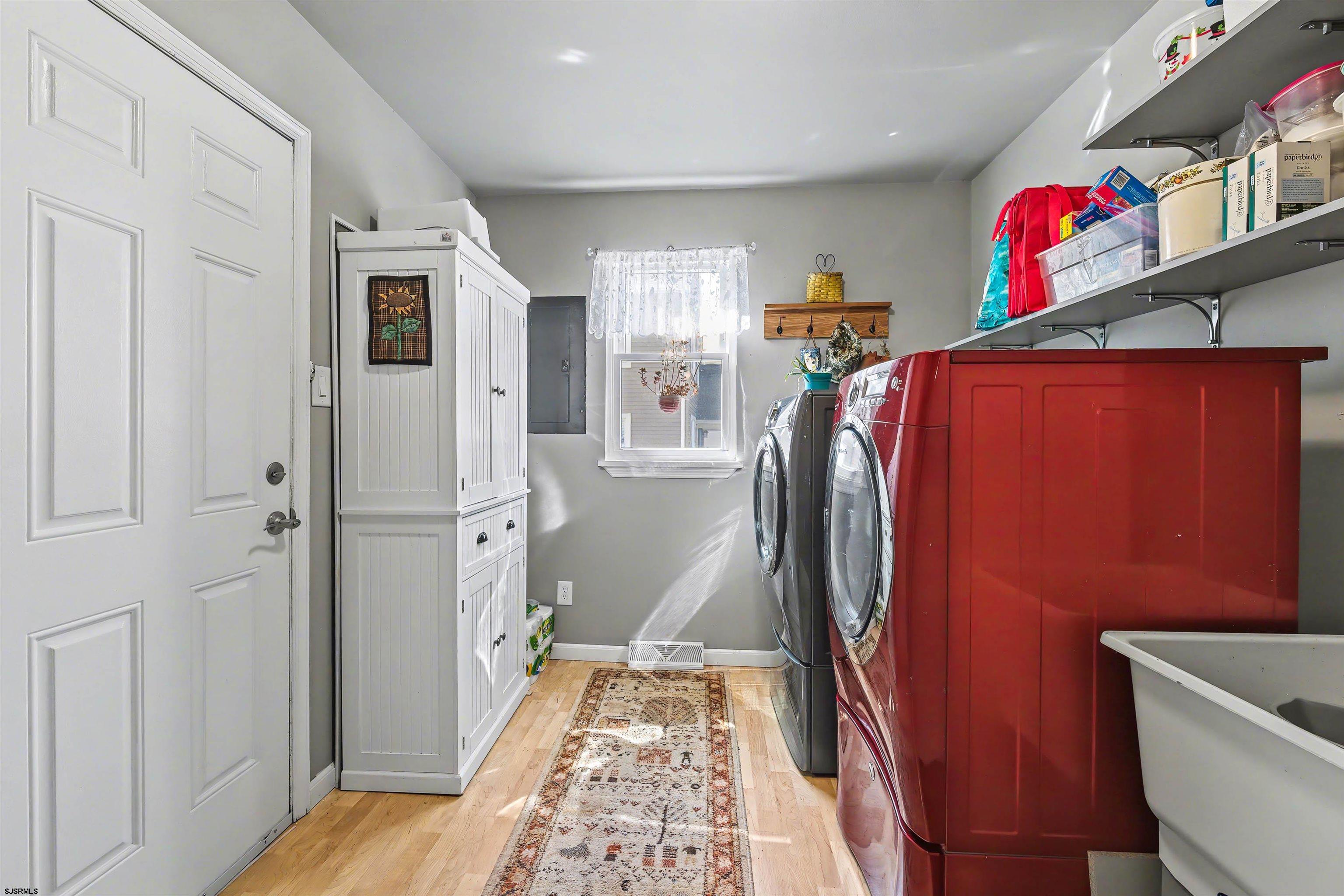 655 Weilers Lane Absecon, NJ 08201 - Photo 19 of 31 a view of walk in closet with clothes and shoes