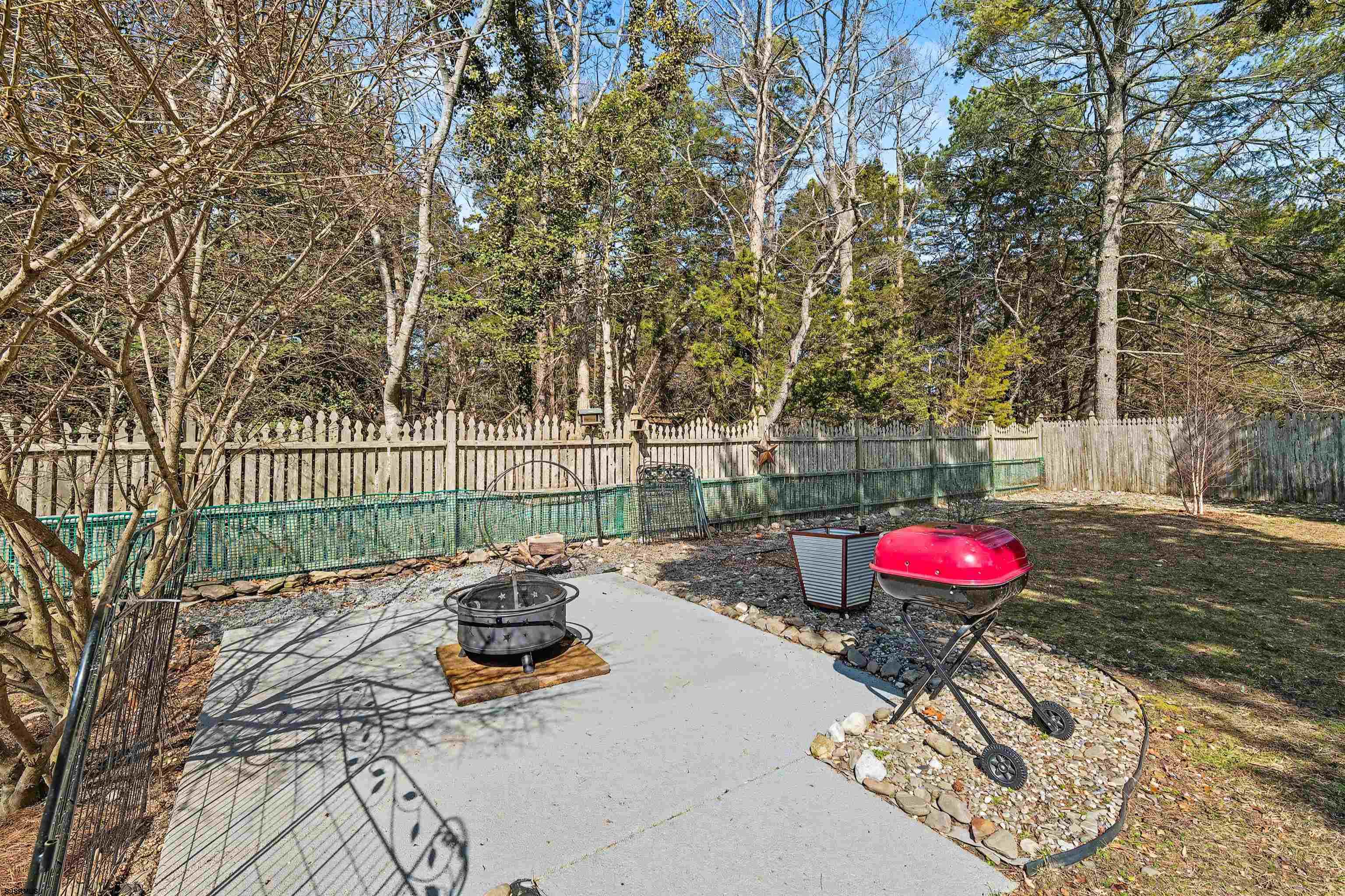 655 Weilers Lane Absecon, NJ 08201 - Photo 25 of 31 a view of a backyard with couches table and chairs