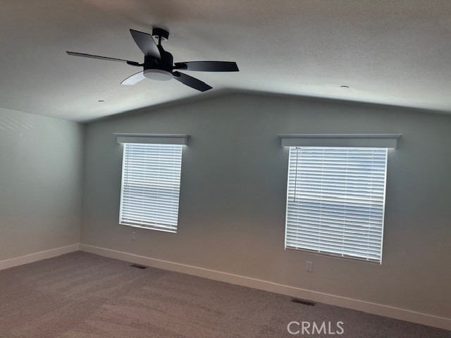 43601 East Florida Avenue, Unit 43 Hemet, CA 92544 - Photo 20 of 21 a view of a livingroom with a ceiling fan and window