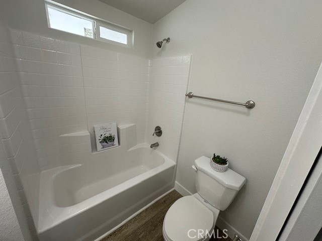 43601 East Florida Avenue, Unit 43 Hemet, CA 92544 - Photo 10 of 21 a white toilet sitting next to a bath tub