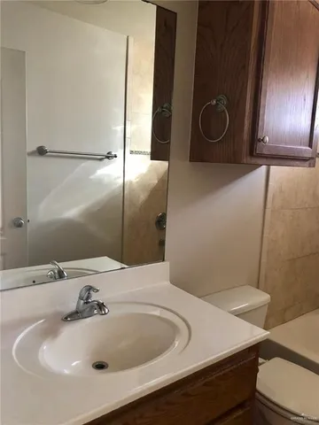 a bathroom with a sink and a toilet