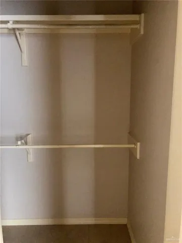 a bath room with a toilet and a bath tub