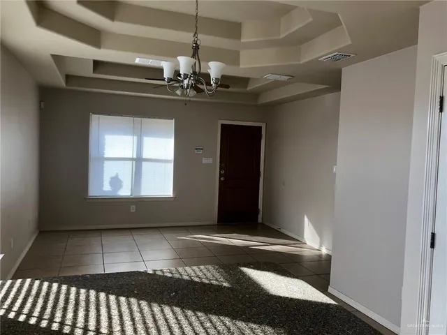 a view of a livingroom with a chandelier