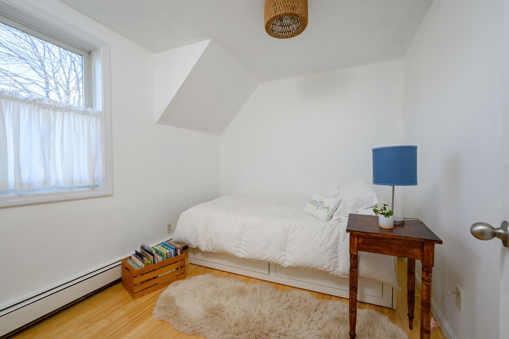 18 Standish Road Hull, MA 02045 - Photo 20 of 35 a bedroom with a bed and a window