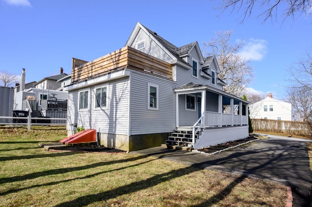 18 Standish Road Hull, MA 02045 - Photo 27 of 35 a front view of a house with a yard