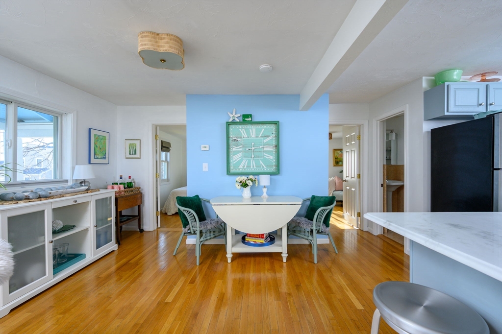 18 Standish Road Hull, MA 02045 - Photo 8 of 35 a dining room with furniture and wooden floor