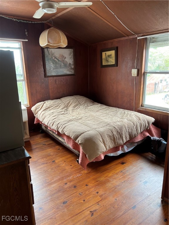 2111 Gardner Court Alva, FL 33920 - Photo 19 of 47 a bedroom with a bed and wooden floor