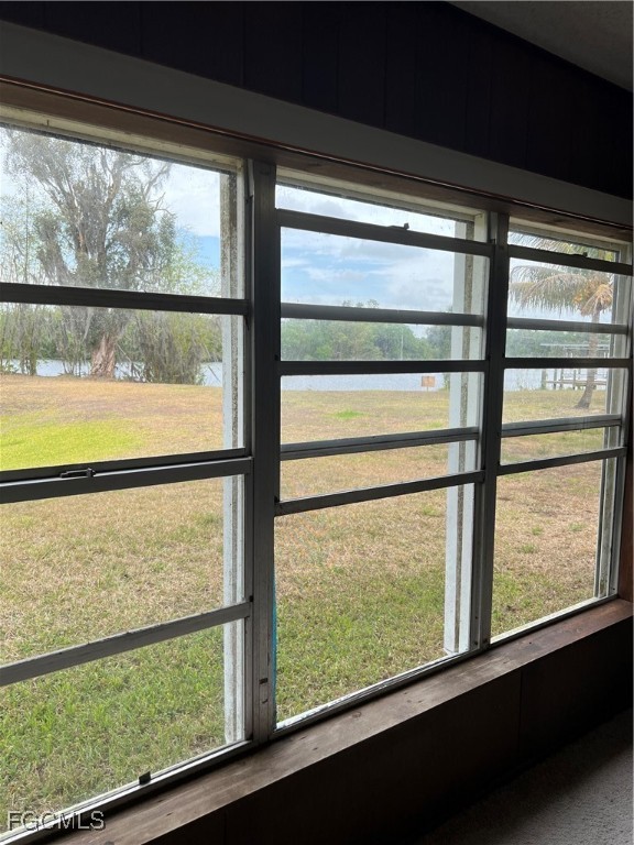 2111 Gardner Court Alva, FL 33920 - Photo 27 of 47 a view of a glass door with a large window