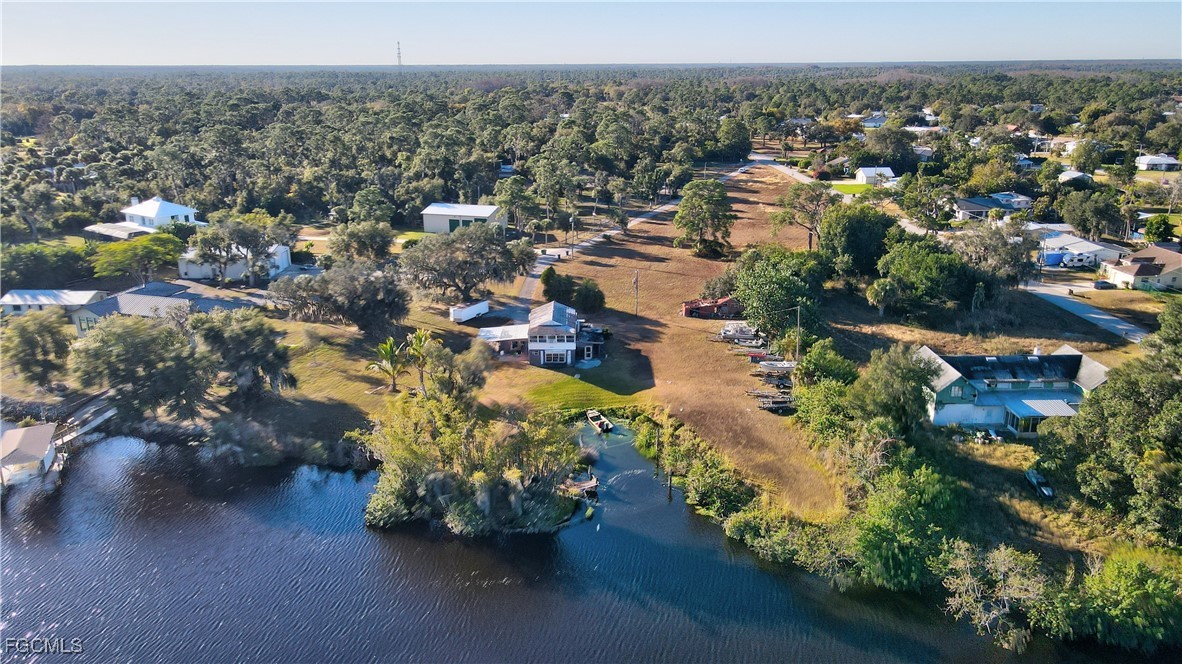 2111 Gardner Court Alva, FL 33920 - Photo 38 of 47 an aerial view of a houses with a yard