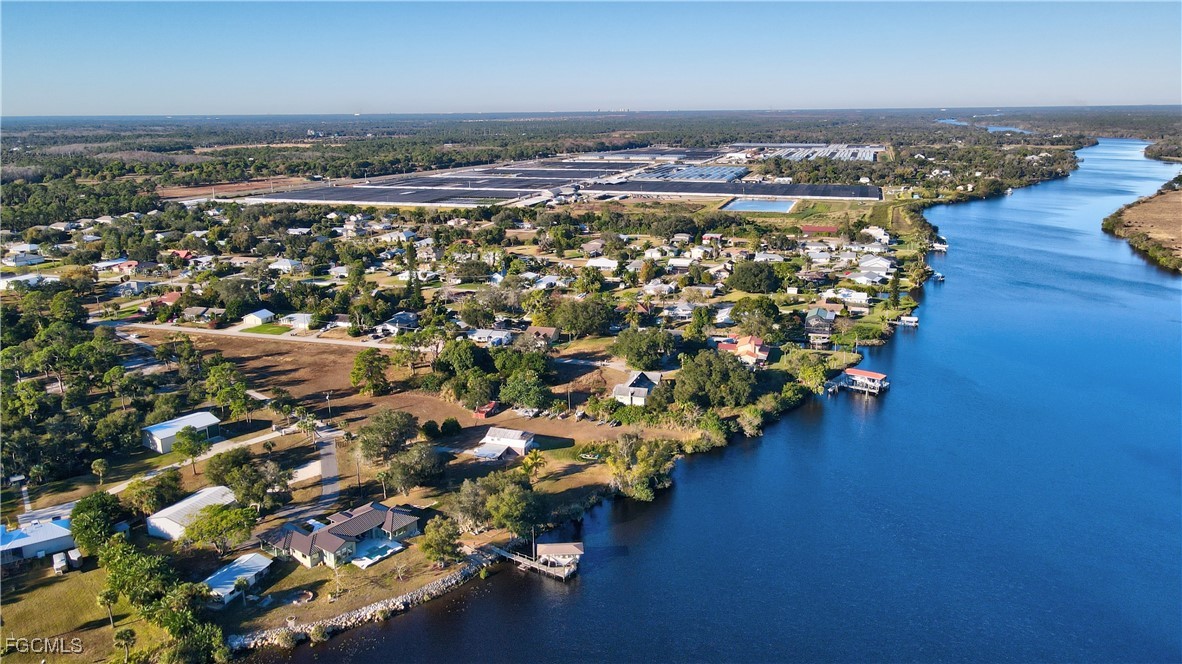 2111 Gardner Court Alva, FL 33920 - Photo 43 of 47 an aerial view of residential houses with outdoor space