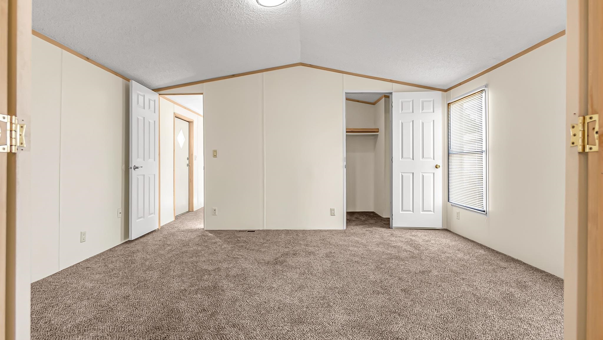 534 Normandy Way Grand Junction, CO 81501 - Photo 19 of 32 a view of an empty room and window