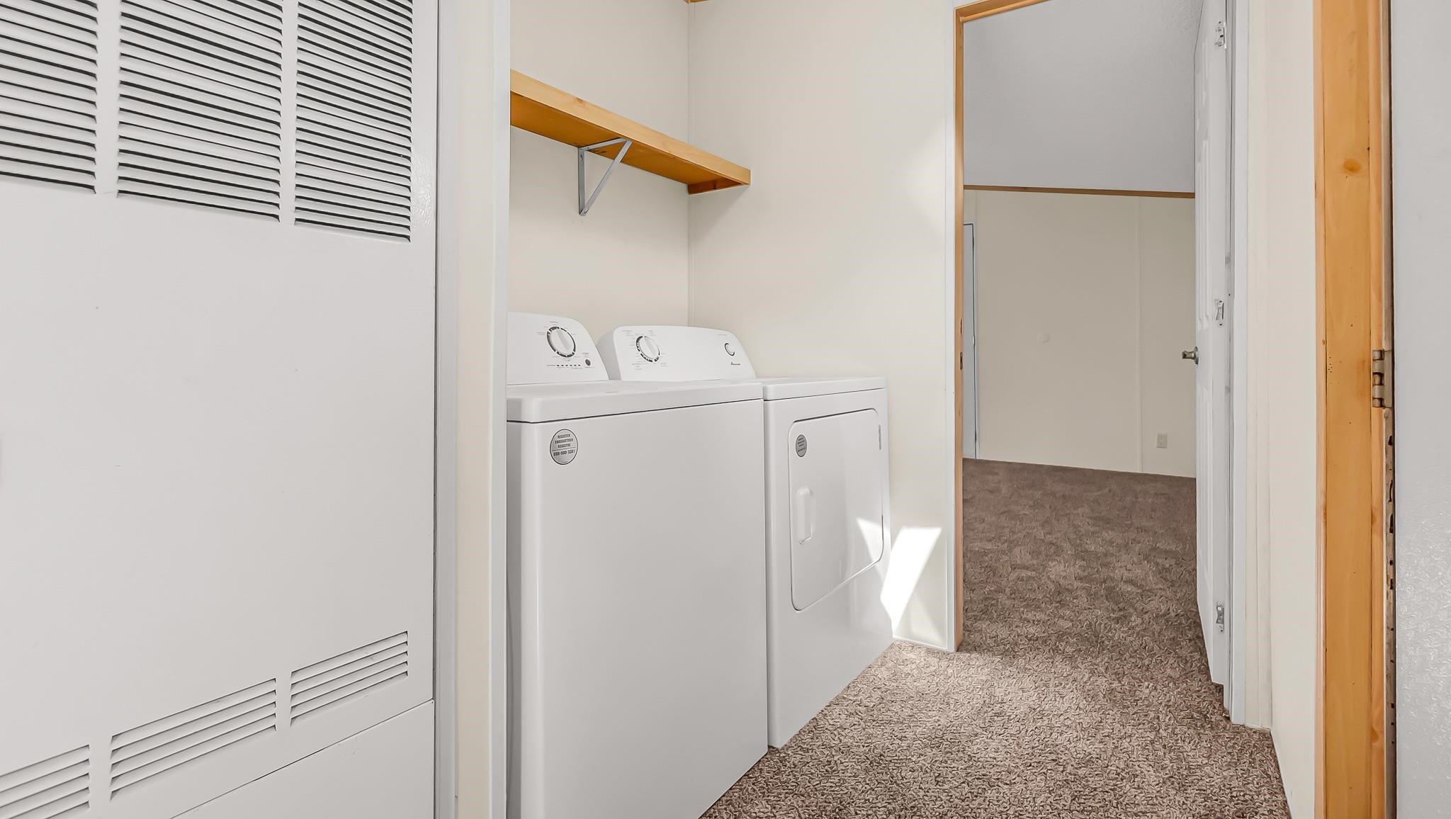 534 Normandy Way Grand Junction, CO 81501 - Photo 22 of 32 a view of a storage & utility room with washer and dryer