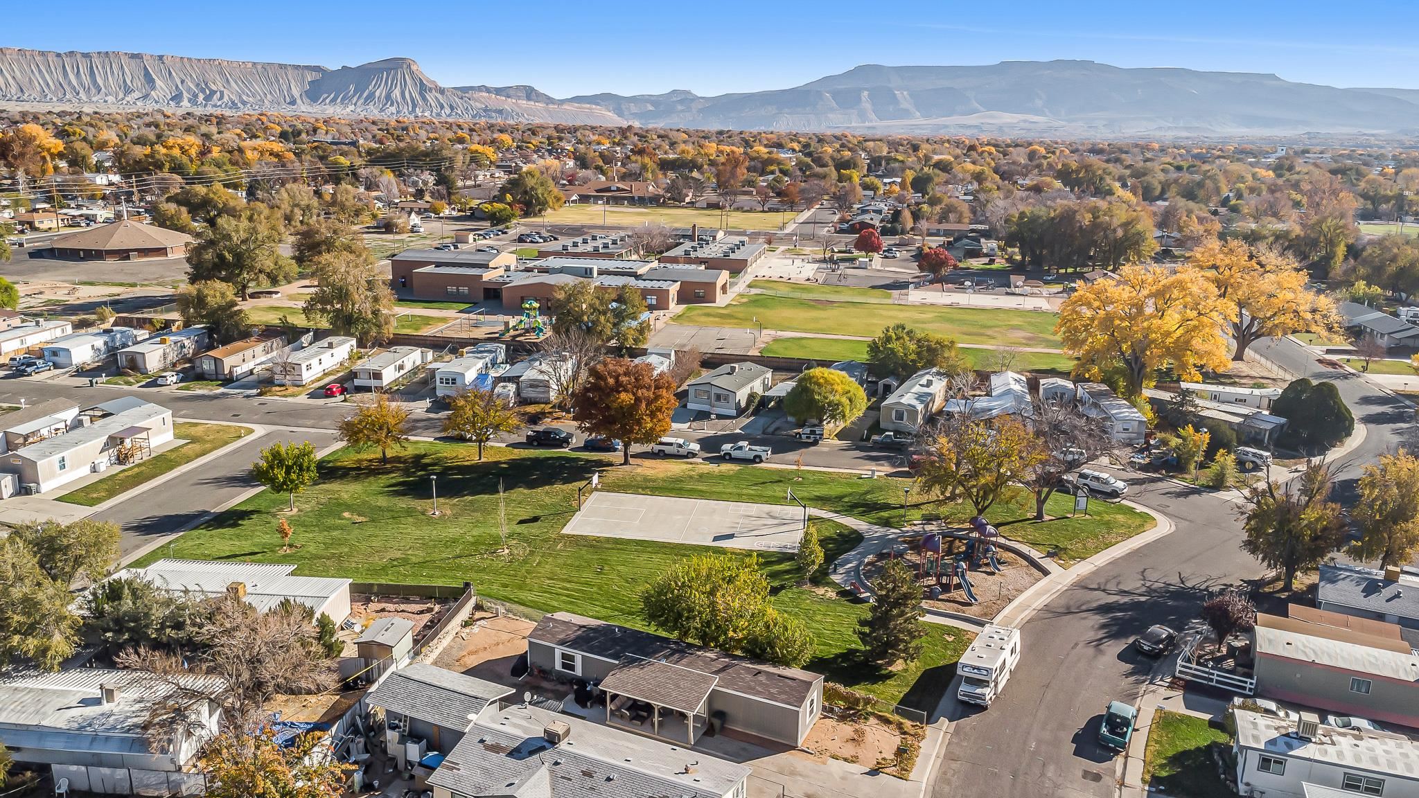 534 Normandy Way Grand Junction, CO 81501 - Photo 32 of 32 an aerial view of residential houses with outdoor space