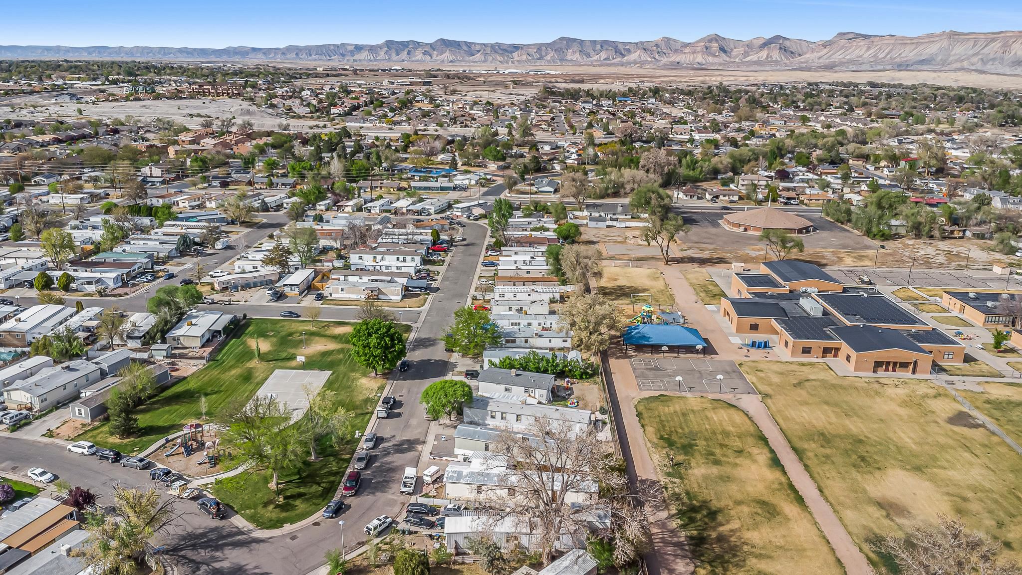534 Normandy Way Grand Junction, CO 81501 - Photo 9 of 32 an aerial view of residential building and lake view