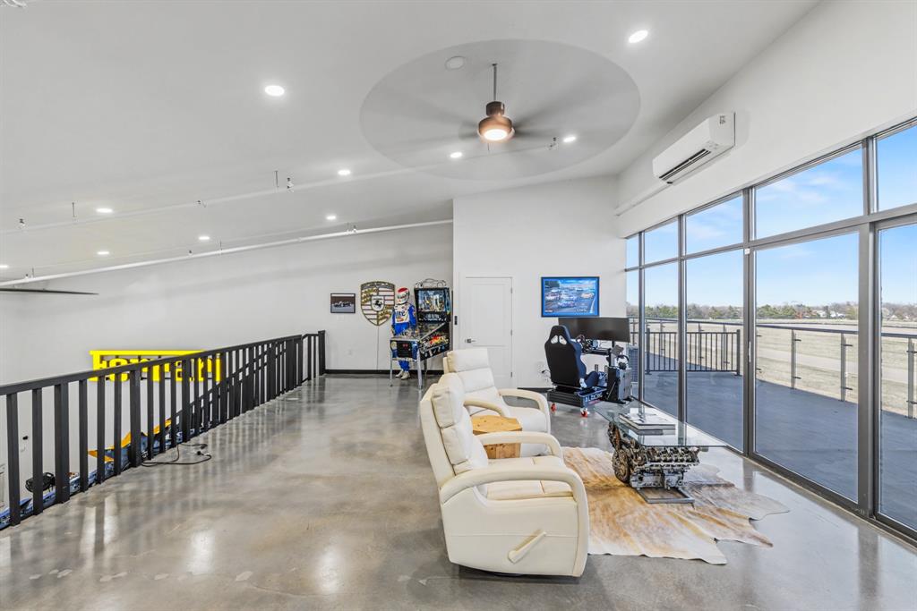 400 Fast Lane, Unit 9 Anna, TX 75409 - Photo 13 of 37 Community lobby with recessed lighting