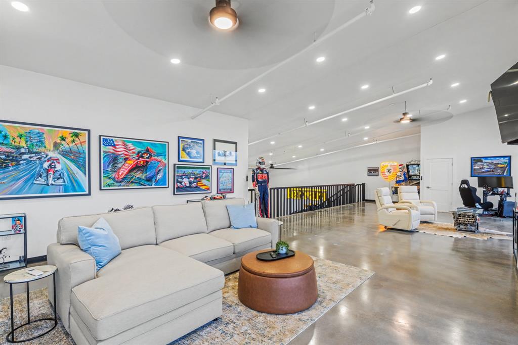 400 Fast Lane, Unit 9 Anna, TX 75409 - Photo 14 of 37 Living area with a ceiling fan, concrete floors, recessed lighting, and a high ceiling