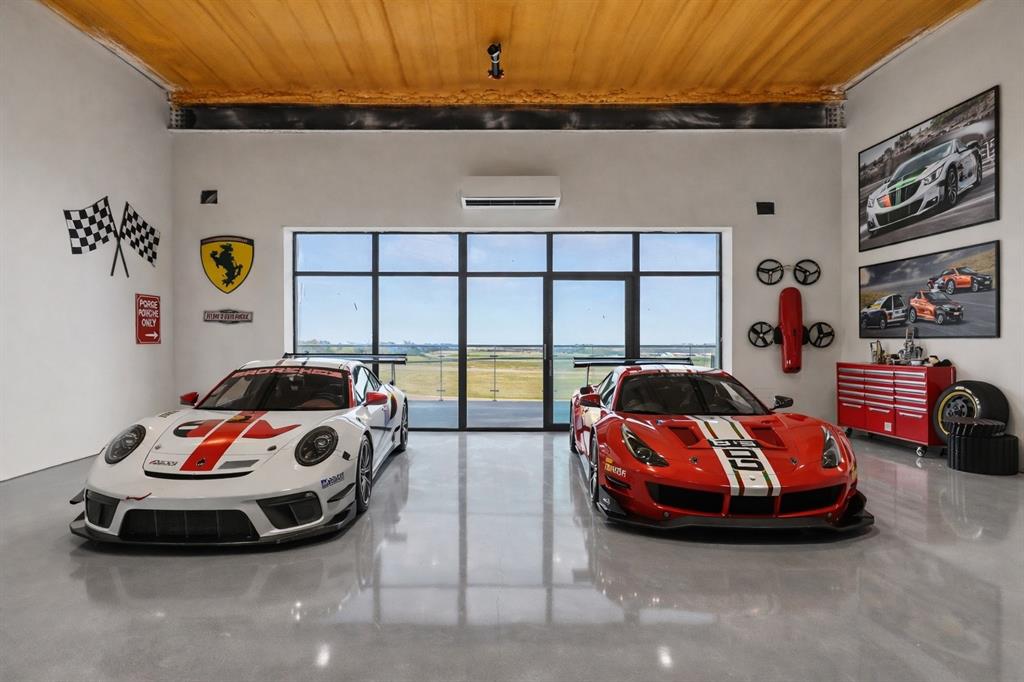 400 Fast Lane, Unit 9 Anna, TX 75409 - Photo 3 of 37 Garage with wooden ceiling and a mini split for heating / cooling