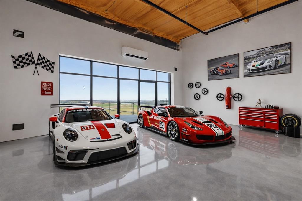400 Fast Lane, Unit 9 Anna, TX 75409 - Photo 5 of 37 Garage with wooden ceiling and a wall mounted mini split