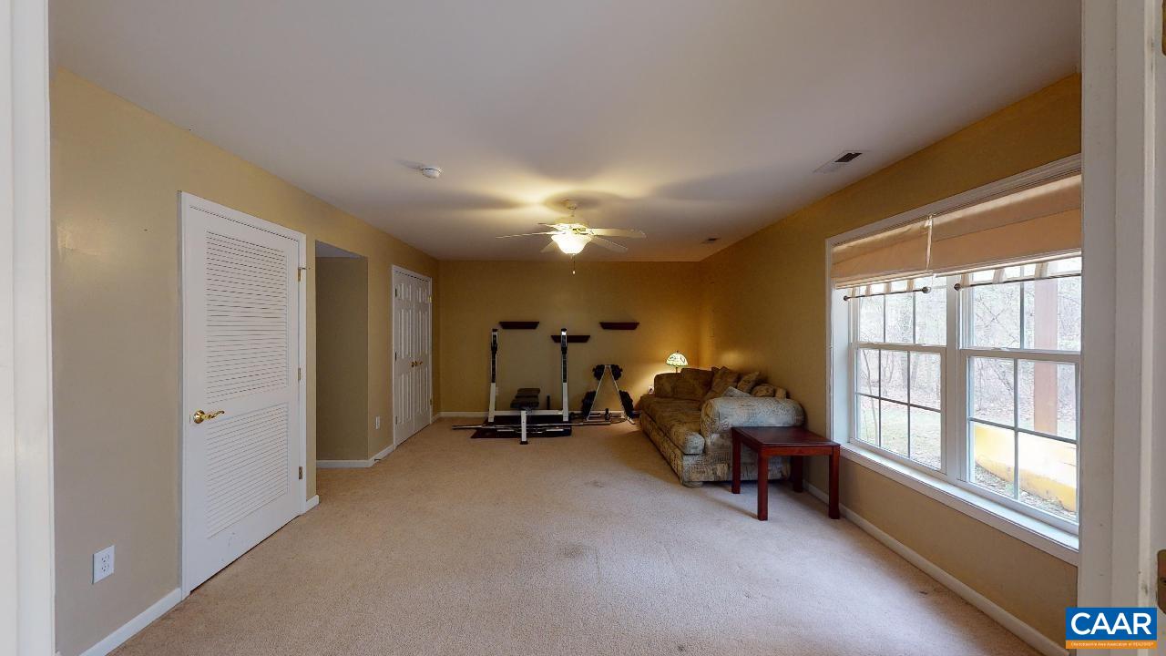 9 Tanglewood Road Palmyra, VA 22963 - Photo 25 of 34 a view of a livingroom with furniture and windows