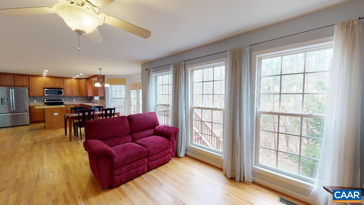 9 Tanglewood Road Palmyra, VA 22963 - Photo 10 of 34 a living room with furniture and a large window