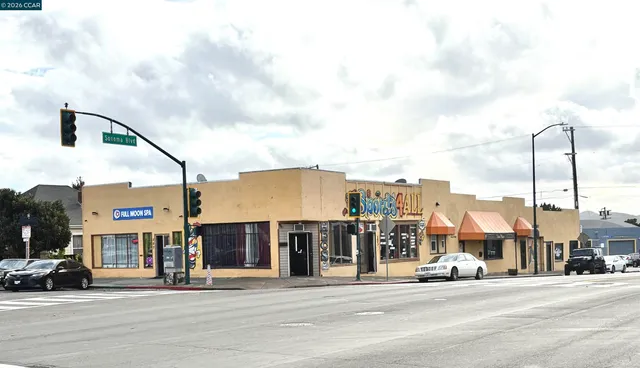 a city street lined with tall buildings