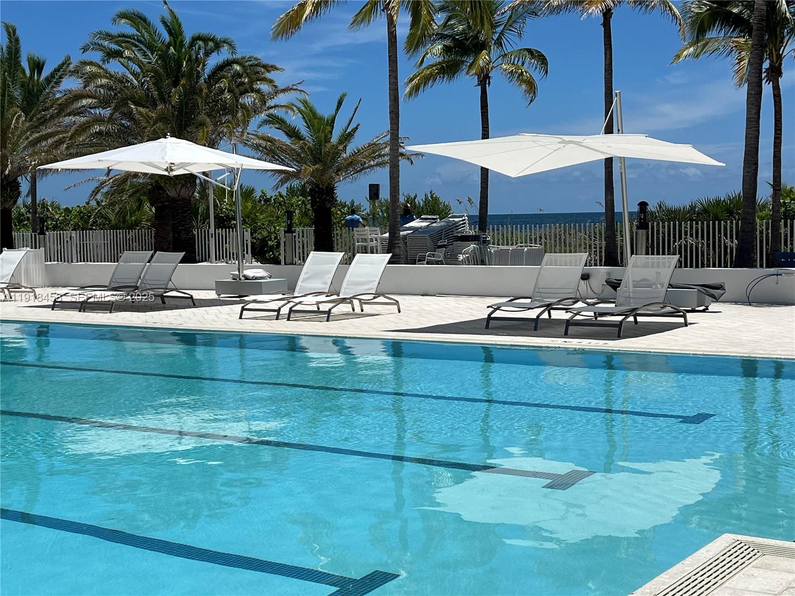 605 Ocean Drive, Unit 2L Key Biscayne, FL 33149 - Photo 29 of 46 SPACIOUS POOL DECK