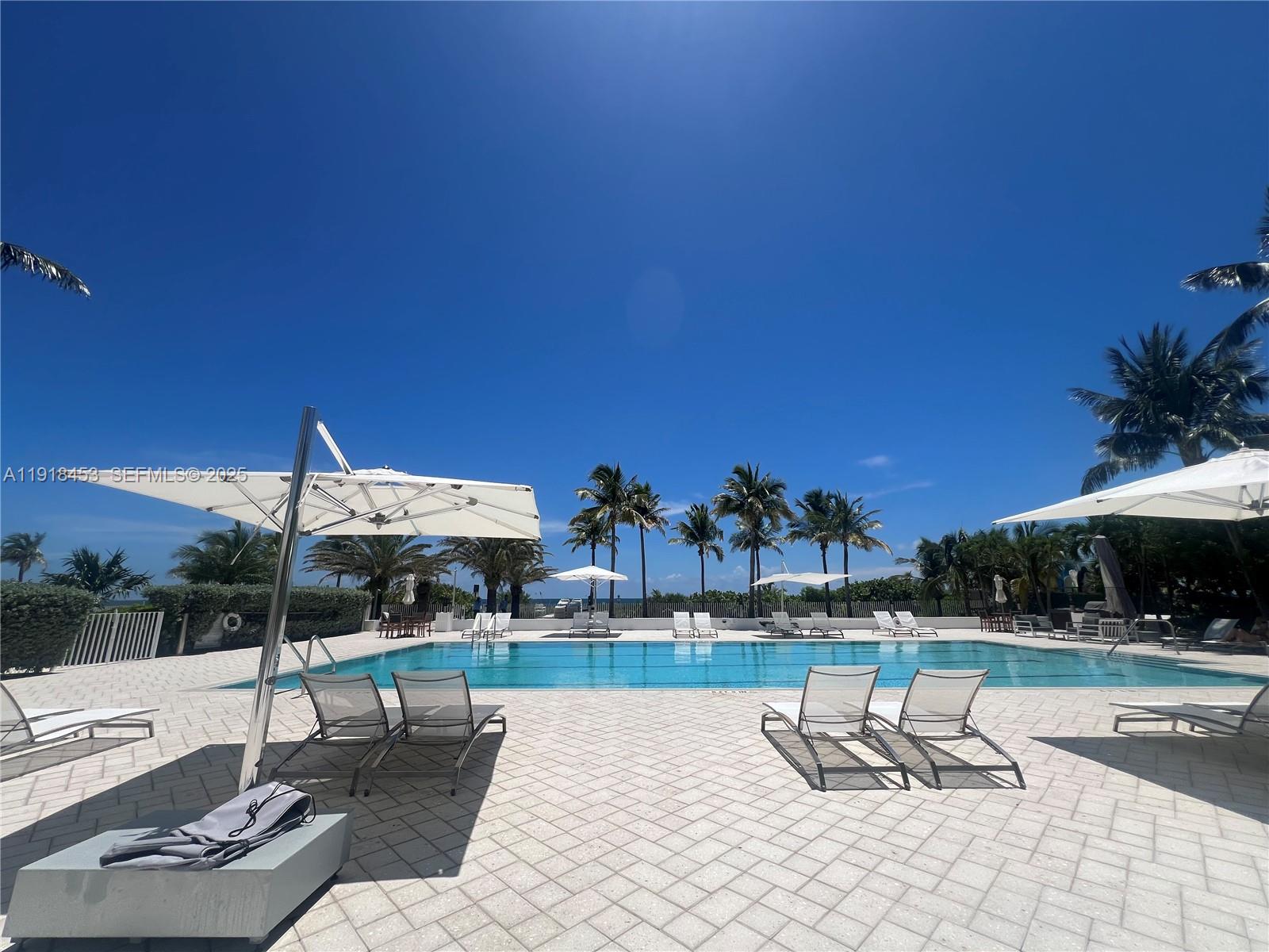 605 Ocean Drive, Unit 2L Key Biscayne, FL 33149 - Photo 39 of 46 RESORT LIKE POOL AND BBQ AREA